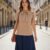 Blusa color beige manga princesa con corbata