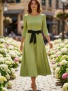 Vestido color pistacho largo ruedo completo