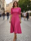 Vestido largo fucsia manga princesa medio ruedo