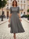 Vestido largo gris manga princesa medio ruedo