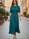 Vestido largo medio ruedo plisado color esmeralda